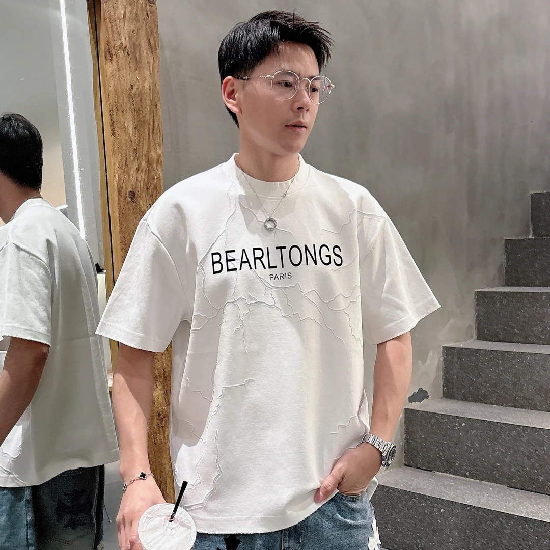 巴家激光破洞烧花绒面立体植绒工艺做旧水洗手工磨破