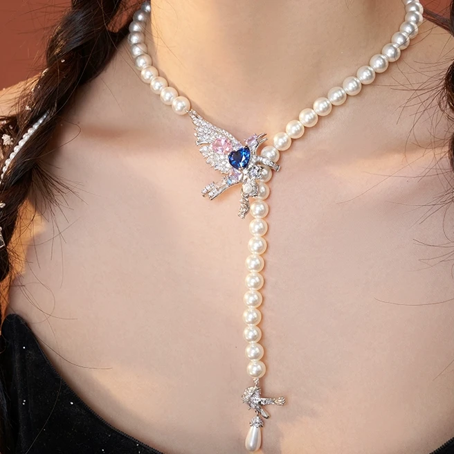 铜合金仿珍珠项链 《流鸦》蓝色y字项链女时尚轻奢高级感毛衣链