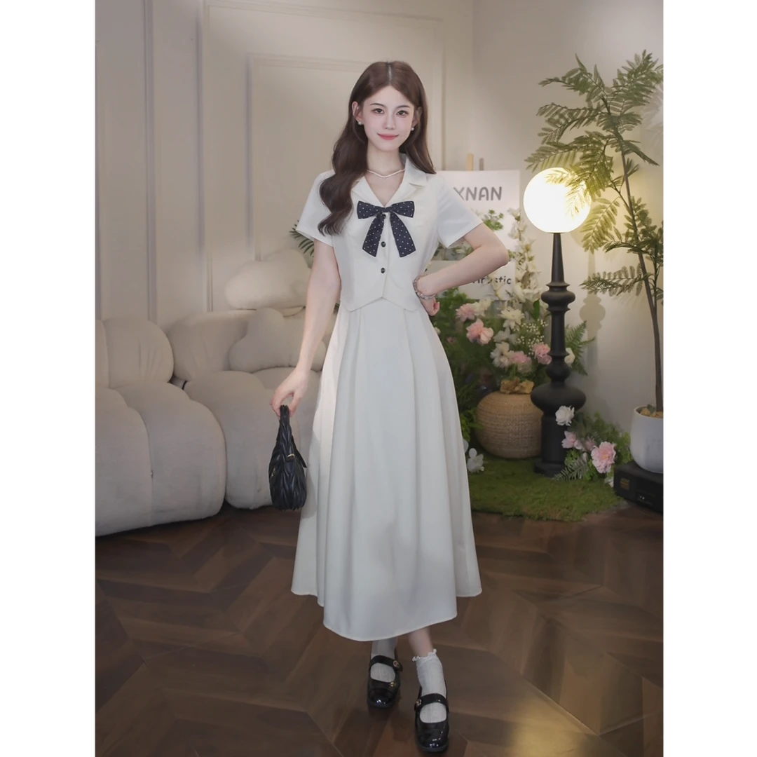 清清【檀杏礼韵】夏季新款杏色V领假两件蝴蝶结收腰显瘦QJD00471