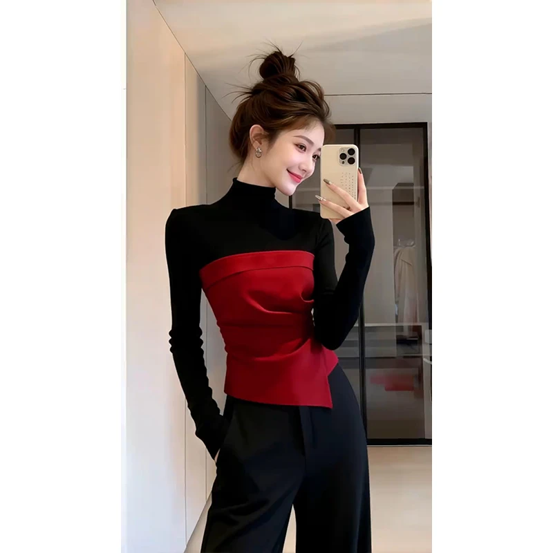 蓝色拼接上衣2026冬季爆款独特漂亮气质名媛高级感收腰长袖T恤