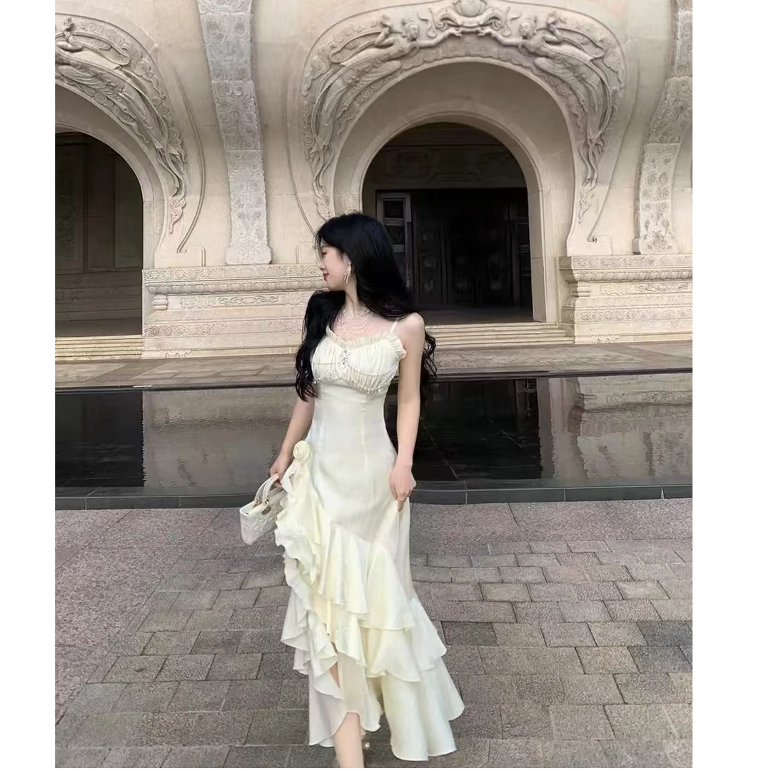 仙气浪漫不规则花朵荷叶边流光吊带裙白月光裙+开衫两件套