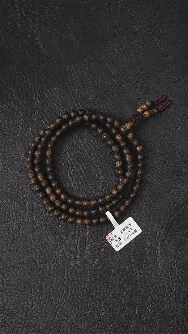 沉香手串文莱黑棋-0.6*108颗-克重：14.4克