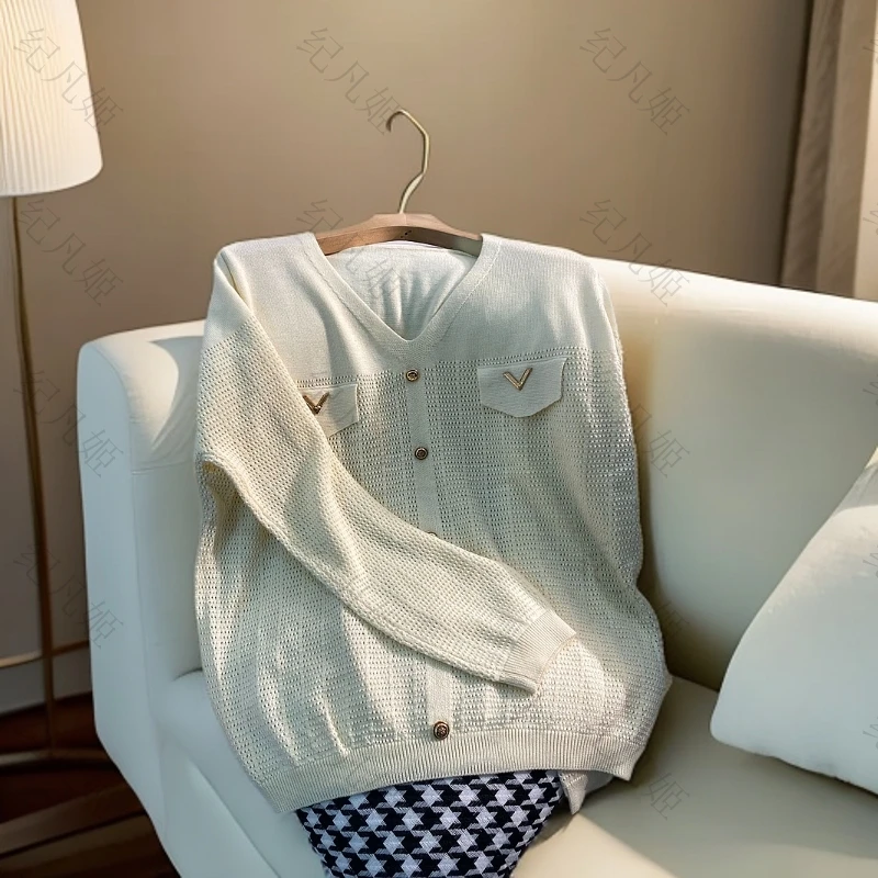 纪凡姬/3907-镂空纯色金属扣针衫毛衣显瘦百搭打底衫