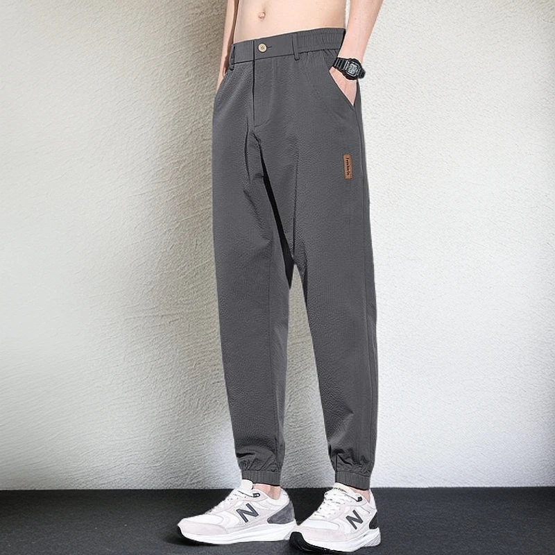 休闲裤男士时尚宽松束脚运动工装裤夏季薄款冰丝速干九分哈伦裤子