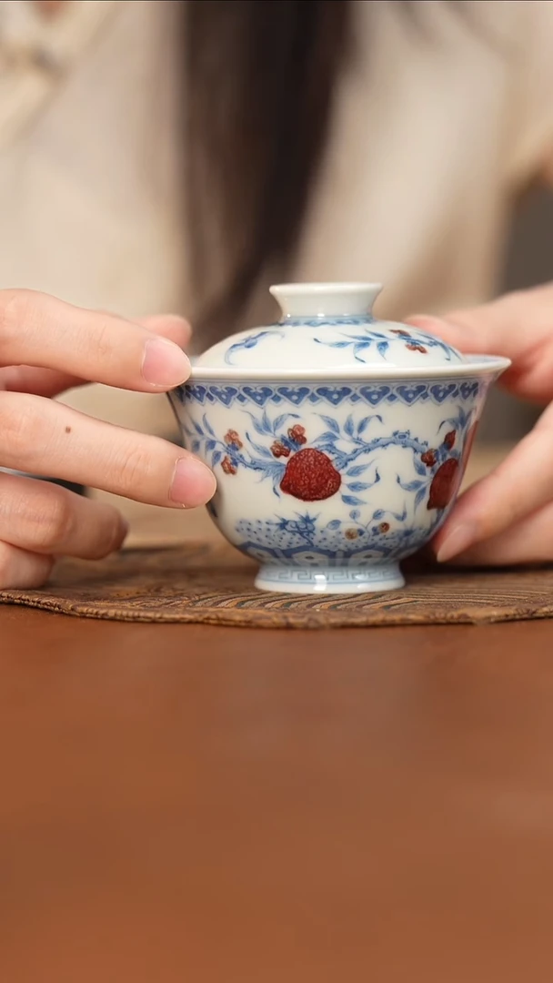 杯屹朴堂青花釉里红寿桃