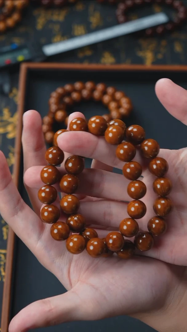 手串紫金鼠油核光珠13+