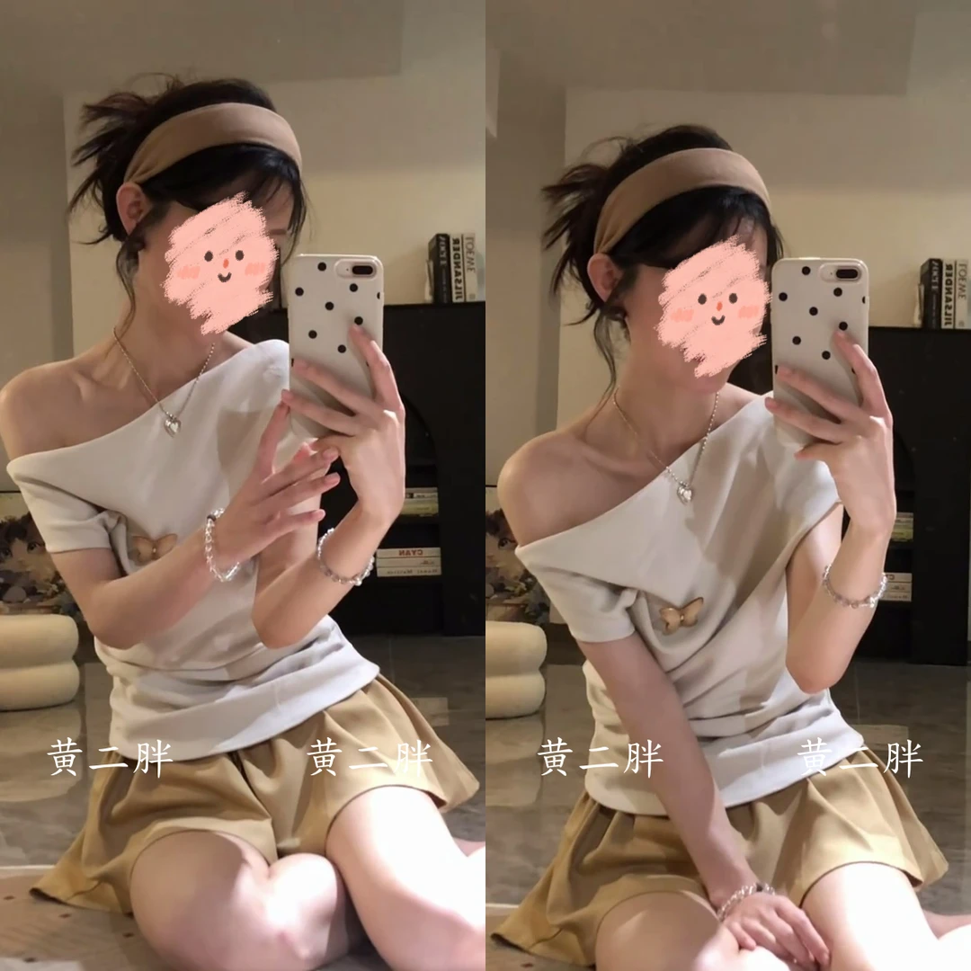 设计感小众不规则露肩短袖夏季节新款修身显瘦斜肩上衣女短裙套装