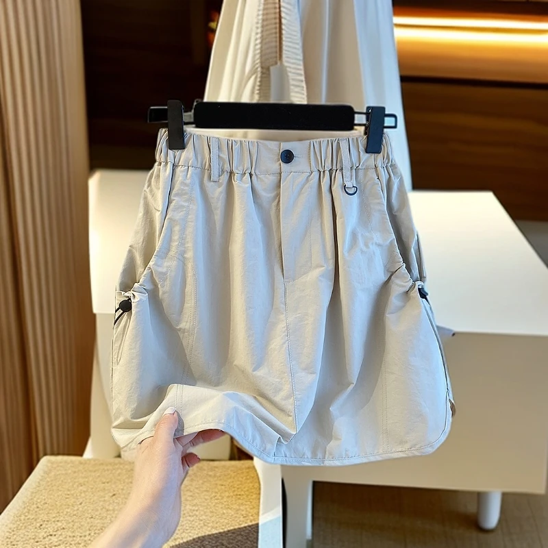 夏季韩版工装短裙女2025新款宽松高腰显瘦复古防走光包臀半身裙裤