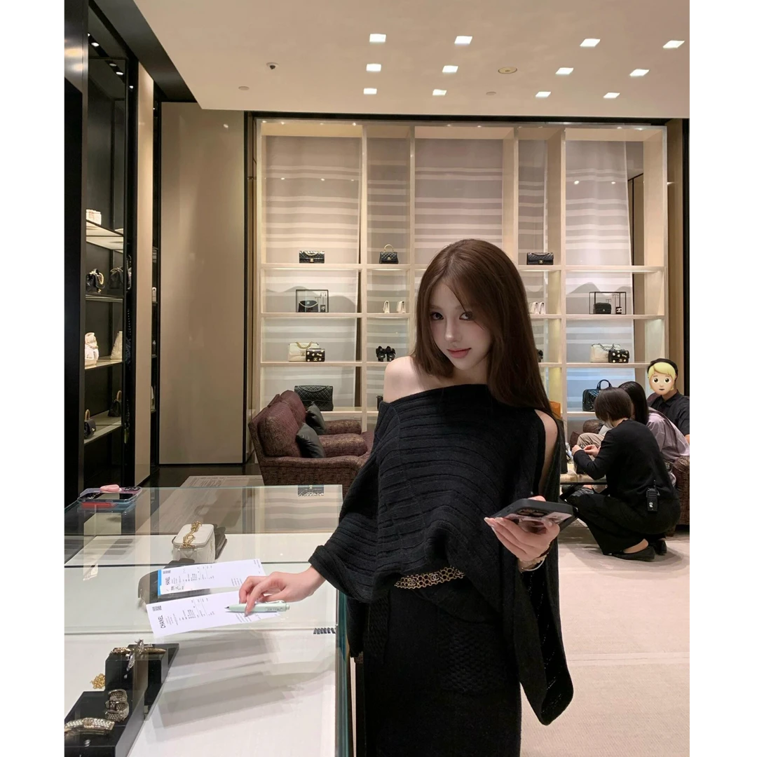 2025秋季新款ins气质御姐范设计感不规则针织上衣女配显瘦半身裙