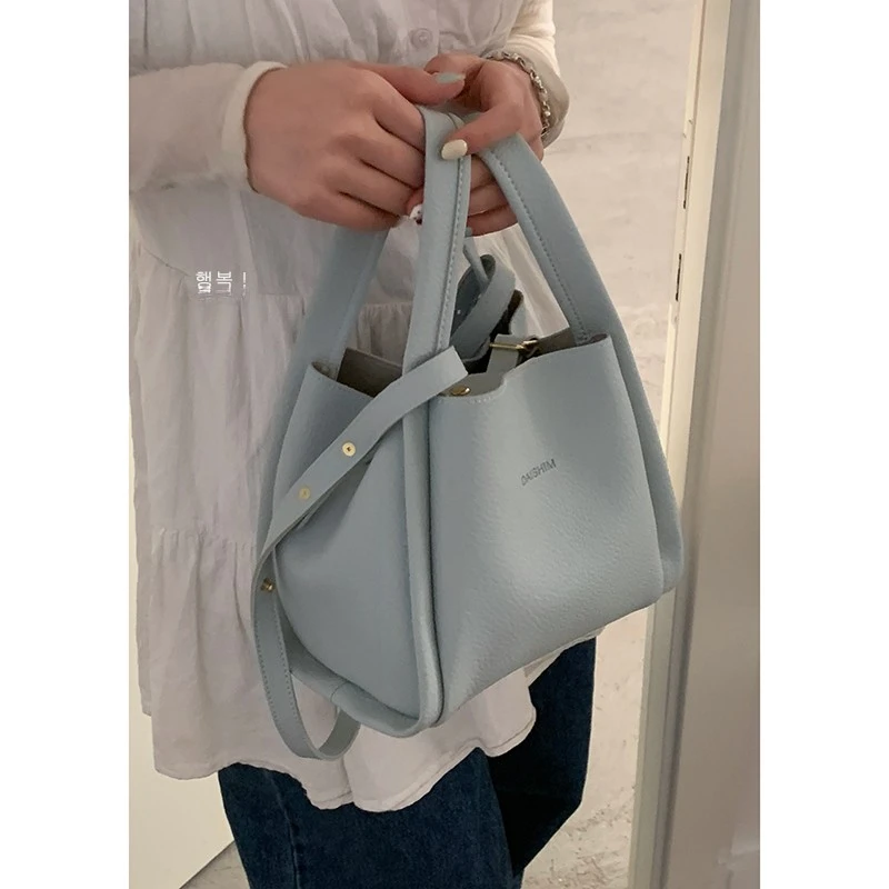 菜篮子包包女款爆款2025新款时尚手提水桶包百搭通勤单肩斜挎包