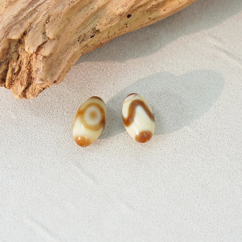 LZ026天然玛瑙牙黄虎牙熊猫三裸珠(多样性发货，发其一)