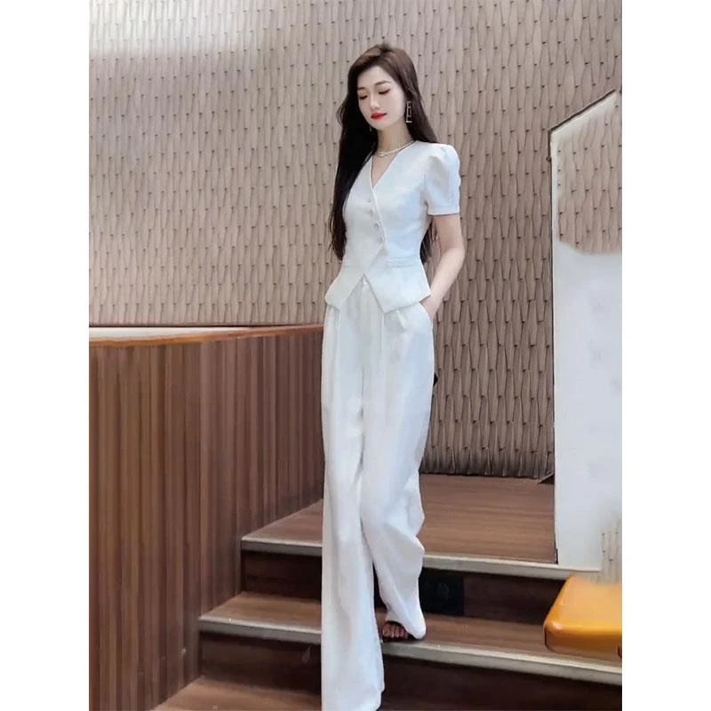 高雅时尚套装女2025夏季新款高级斜纽扣16170高个马丁靴女款套装