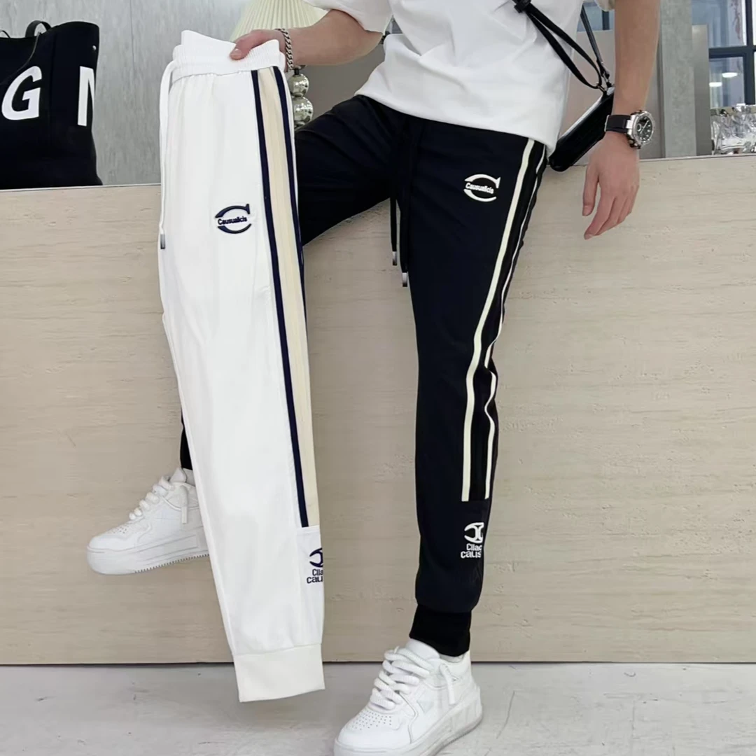 男士春季新款百搭织带拼接修身束脚弹力百搭时尚休闲卫裤运动裤