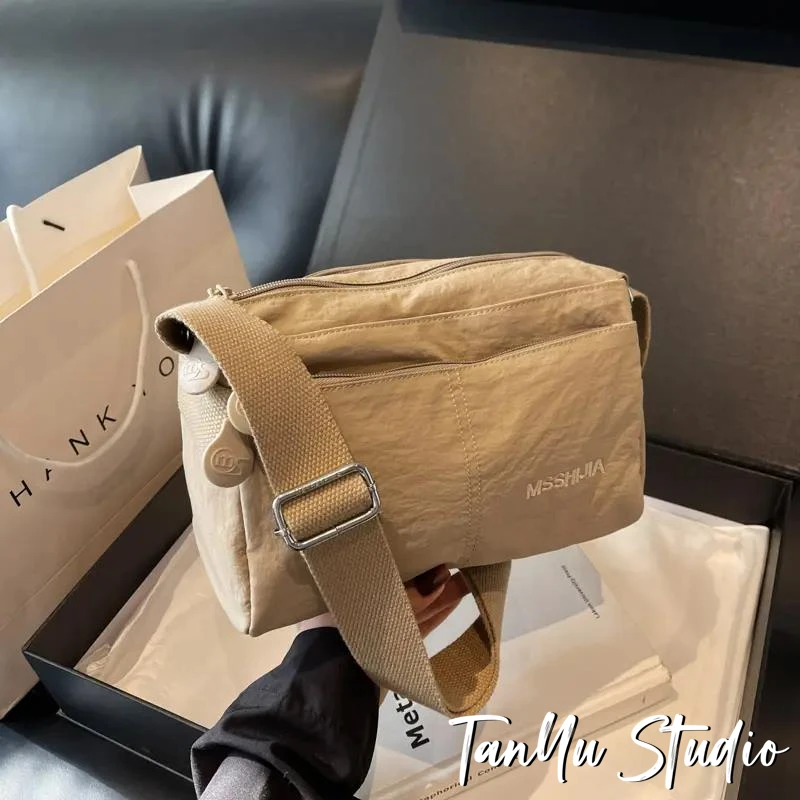 探屿潮牌男女多层时尚百搭单肩包设计感洋气小众休闲轻便斜挎布包