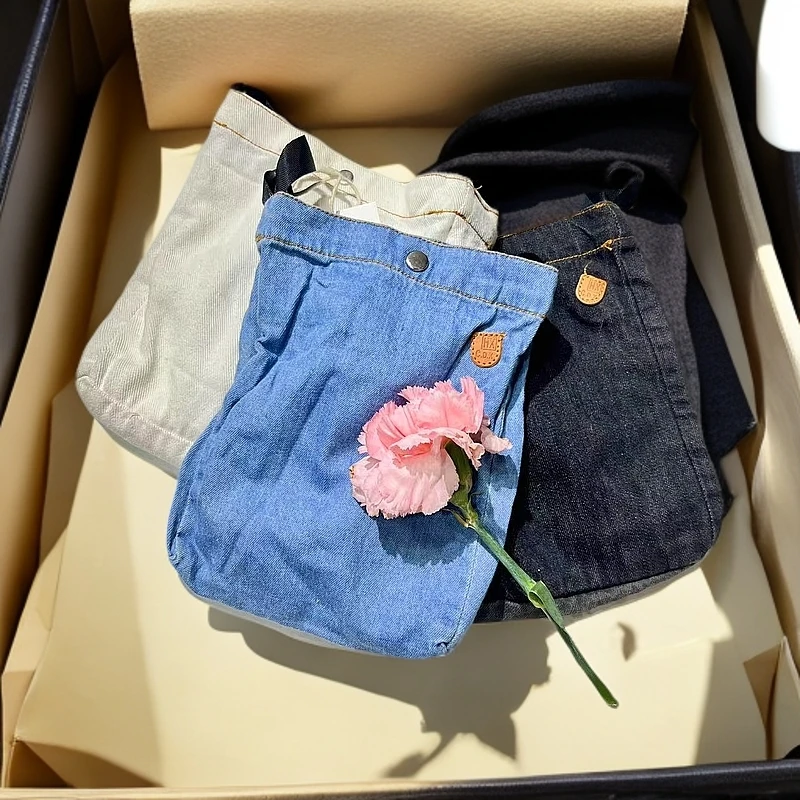 时尚站女士牛仔手工简约口袋单肩包250305