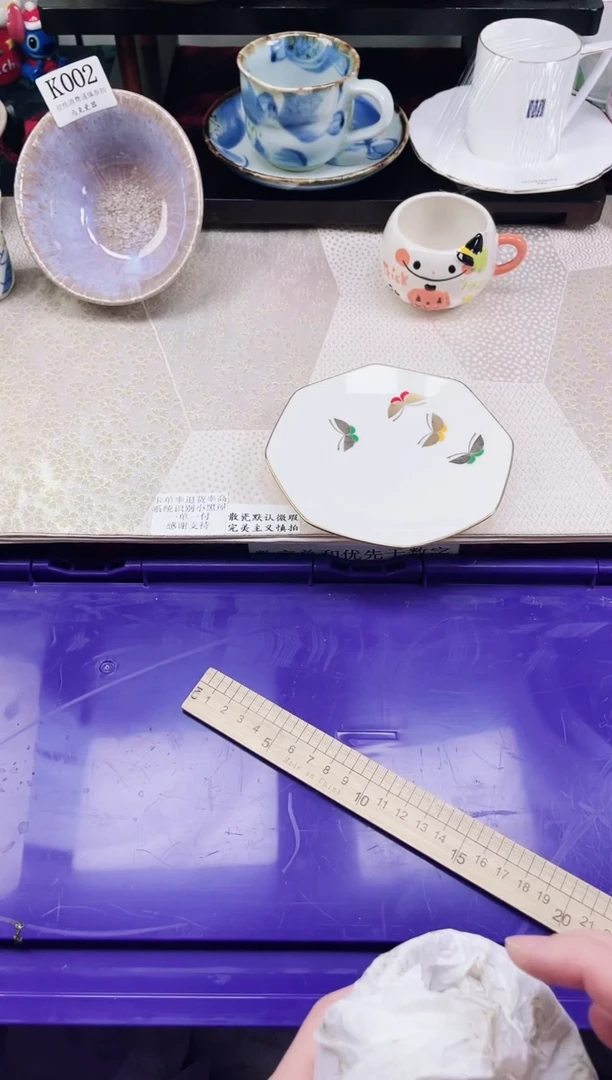 瓷片k****猫                K042