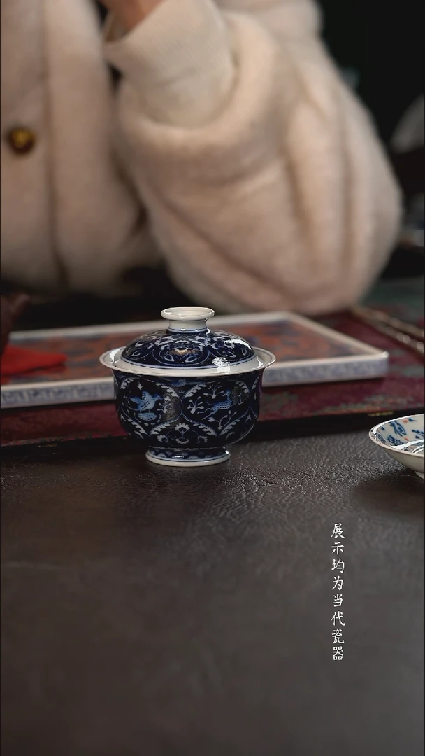 洪印慕明蓝地凤鸟瑞兽元宝盖碗