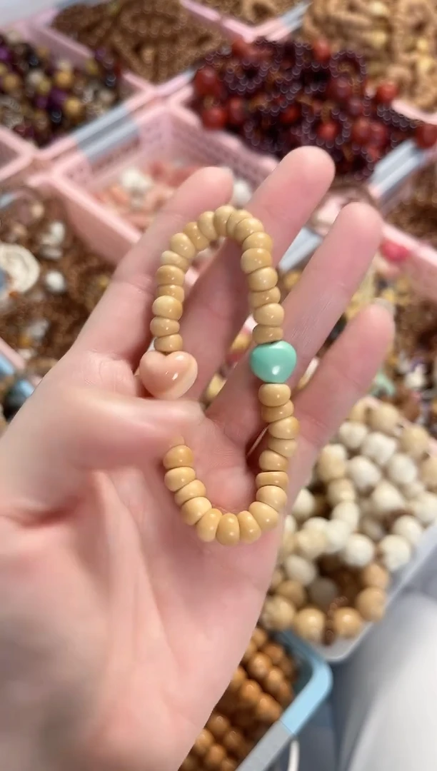 菩提根/象牙果手串龙脊算大肠女王贝爱心手串