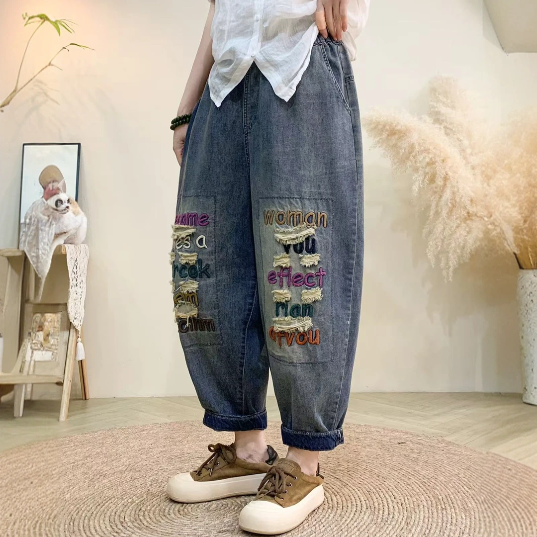 8804设计感牛仔裤蝴蝶结小哈伦裤大码女裤2025春季水洗磨白宽松锥