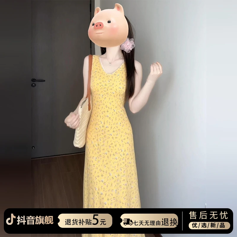 法式无袖v领黄色碎花连衣裙子女夏季2025新款海边度假风收腰长裙
