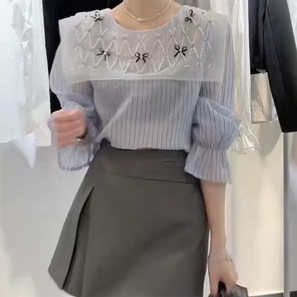 早春时尚设计感小众法式显瘦衬衫长袖百搭气质圆领洋气衬衣