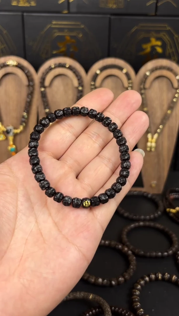 椰蒂吊坠7*6黑金椰蒂镶标无相手串