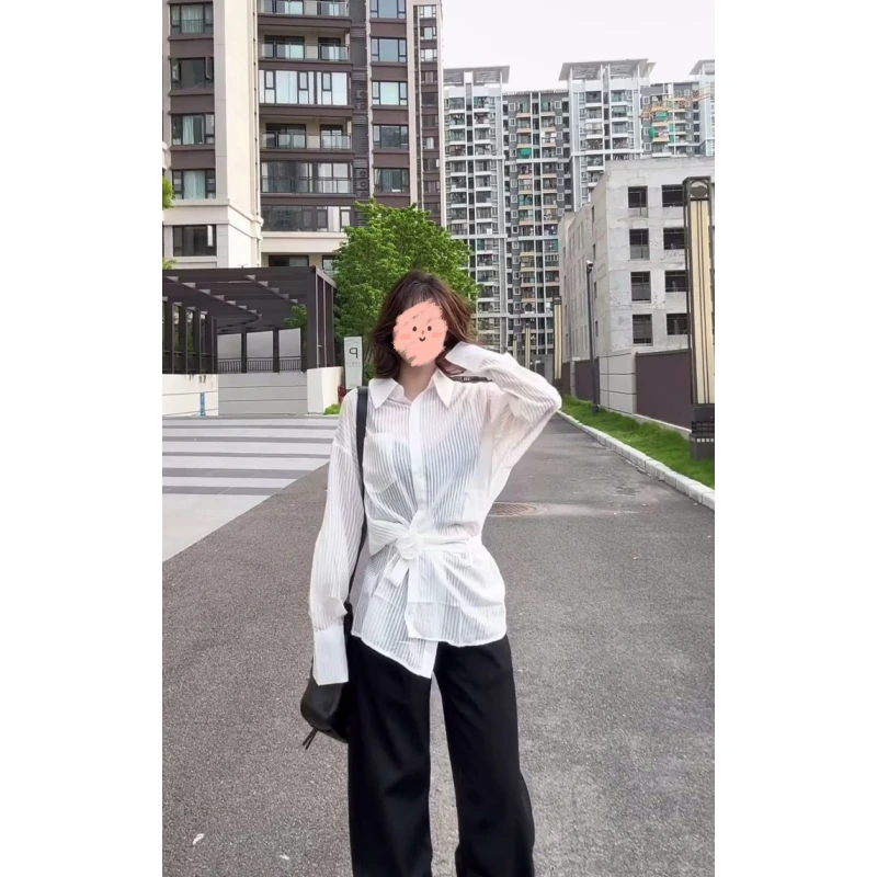 白色微透条纹长袖衬衫女早秋2025新款法式休闲腰侧纽扣多穿法上衣