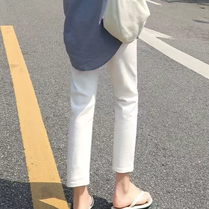 库存女士薄款直筒裤白色牛仔裤50190