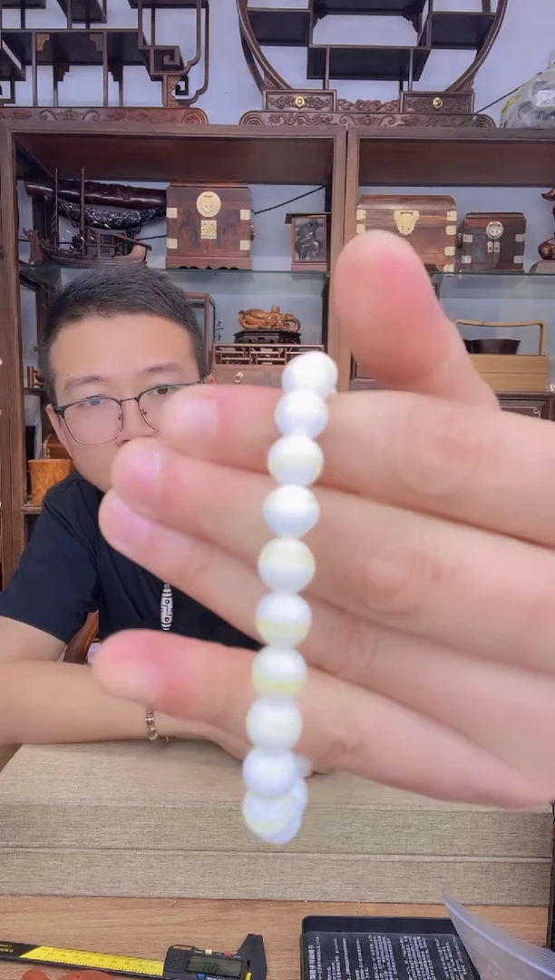 乌木类书架320塑料金丝0.8单圈手串