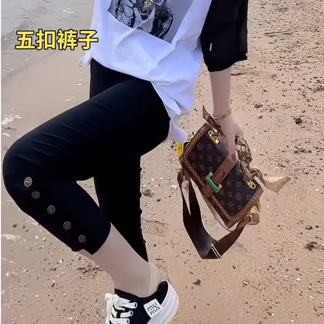 五纽扣八分休闲裤时尚百搭