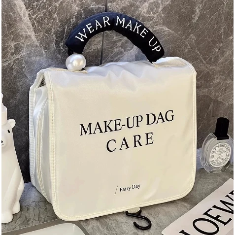 化妆包女士2025新款高端化妆品收纳包大容量防水洗漱包手提珍珠包