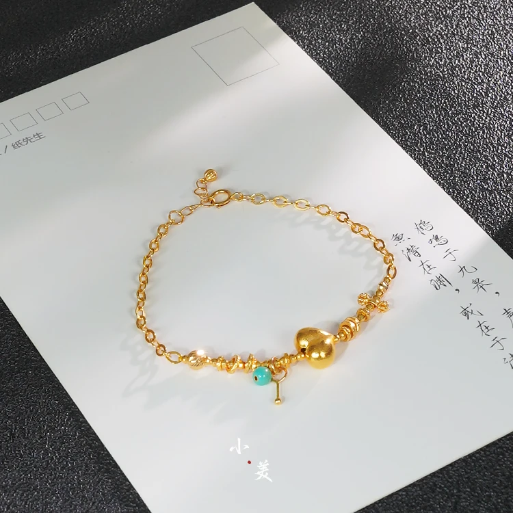 18K金屁桃环环相扣手链（多样性发货）G9942