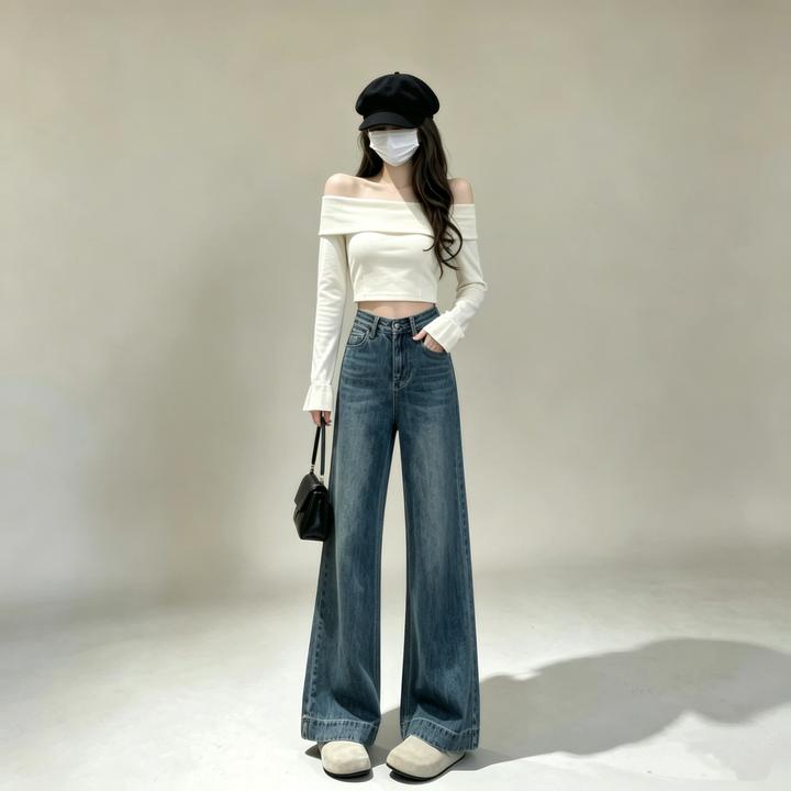 2026年早秋新款百搭不贴腿牛仔裤女三寸翘气质中高腰显瘦微喇