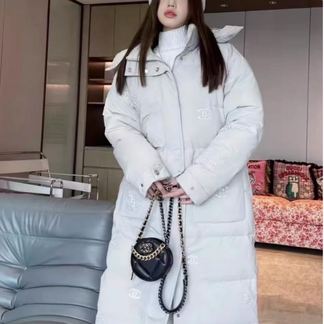 99新 Chanel/香奈儿 38码21N滑雪系列浅灰色长款连帽羽绒服