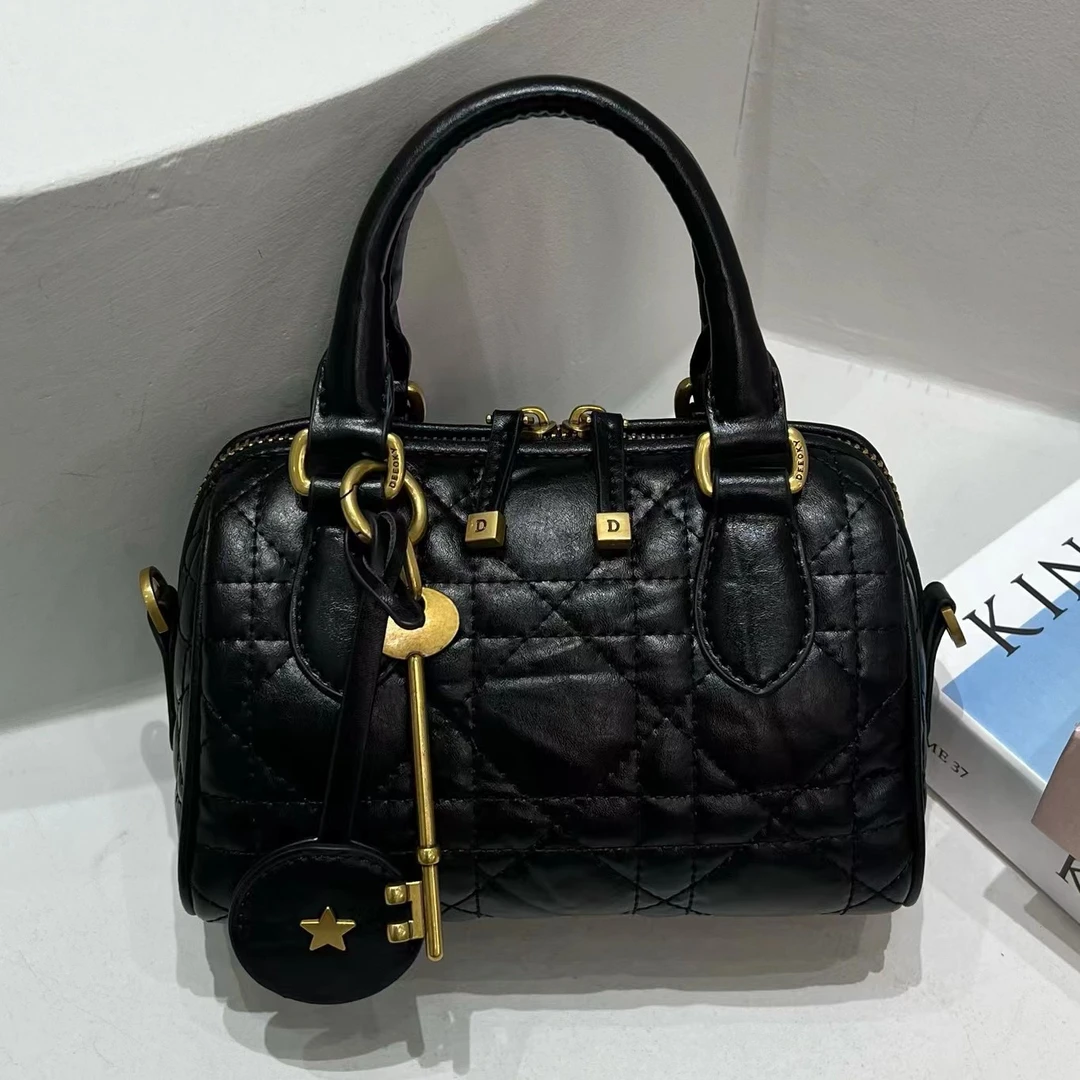 【芝麻集】ZT-D7070-手抓牛皮黑RAIN.CUN简约腋下斜跨轻奢女包