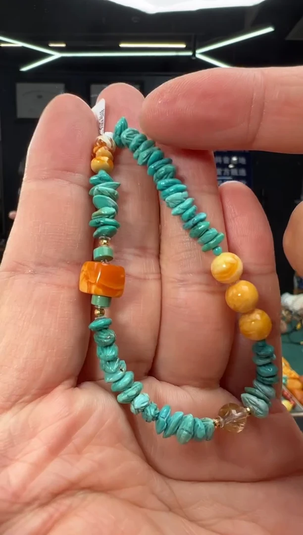 裸石琥珀18K金镶嵌绿松百香籽手串-s31