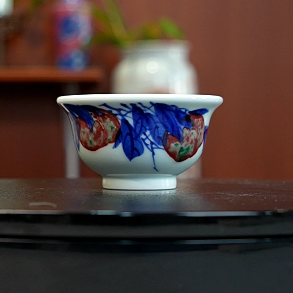 12.29/N100130/00694/青花釉里红寿桃压手杯/口径9/高5/75cc