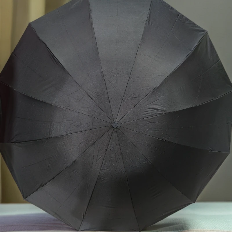 超大12骨防风折叠黑胶晴雨伞抗风太阳伞遮阳黑色八角雨伞折叠雨伞