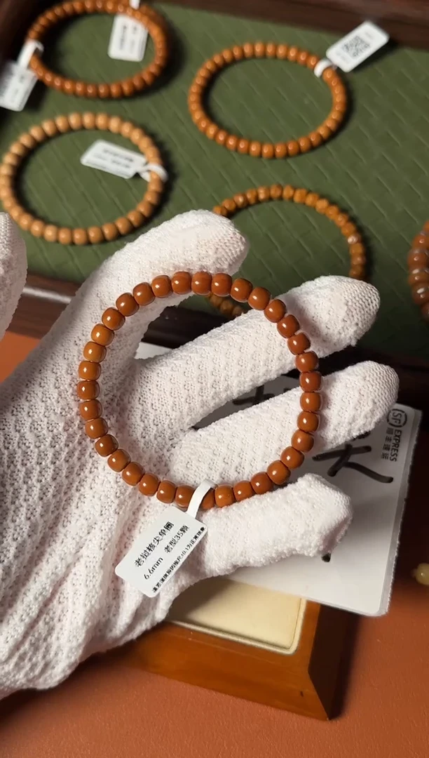 手串橄榄核6.6mm SS级老挝一代核尖老型单圈 三花面无白 高油高密