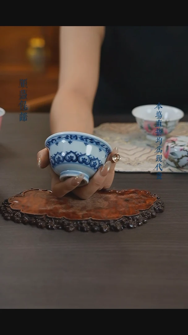 宁封窑青花宝相花卉压手杯