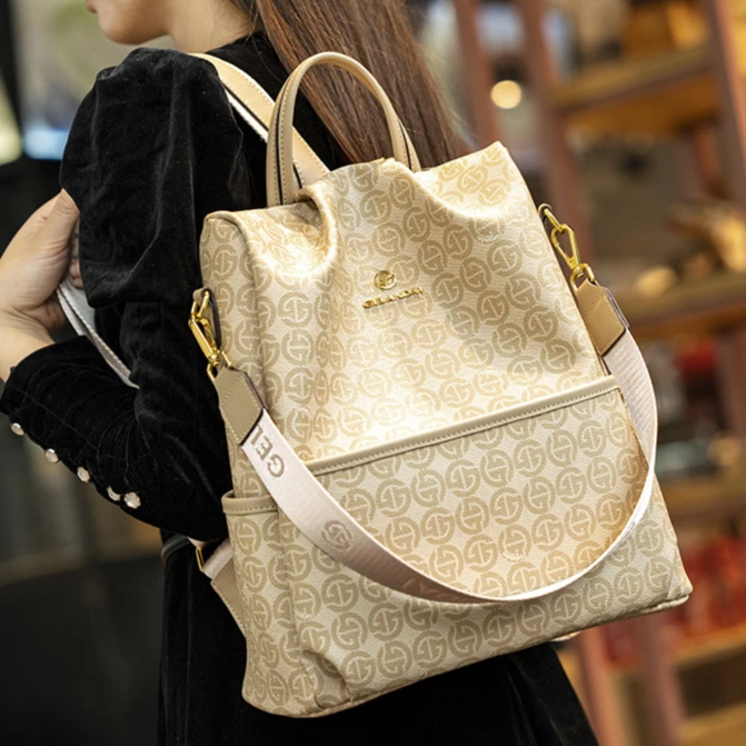 香港品牌戈兰黛2025真皮时尚休闲多功能大容量双肩包女士百搭背包