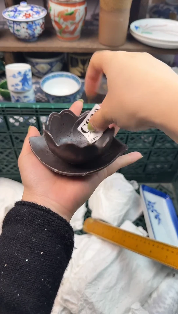 瓷片陌**开