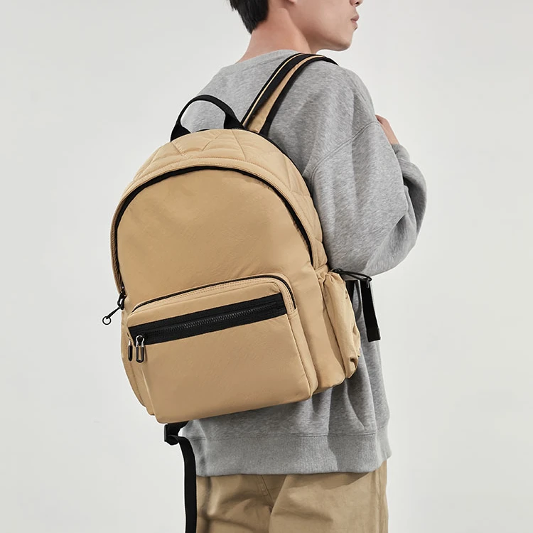 男士双肩包2025新款大容量旅行轻便背包男女通勤电脑包大学生书包