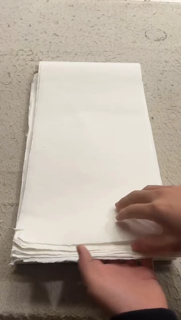 5  手工带毛边白色生宣25×150  50张