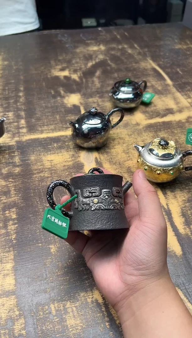 呆坐手敲錾刻墨韵饕餮高升壶