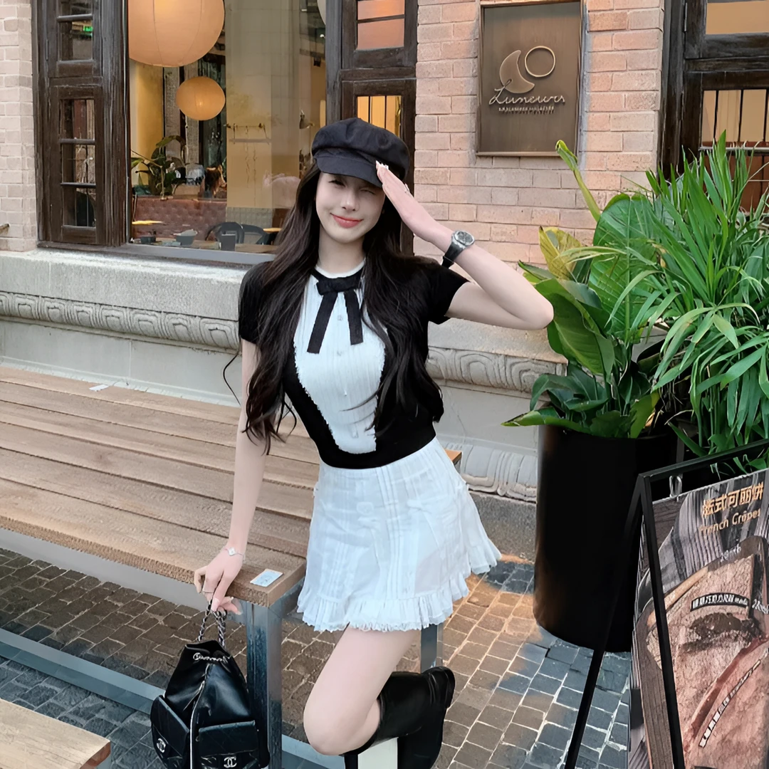 甜美白色高腰半身裙女2025春夏新款设计感压褶蕾丝花边拼接短裙