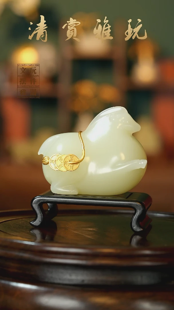 玉《马背金币》手把件摆件