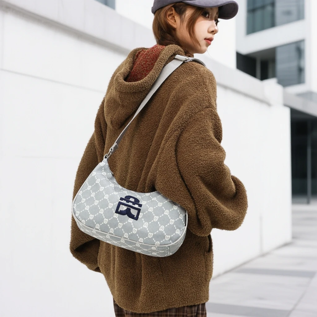 2025新款高级感百搭手提单肩通勤包小众设计法式甜酷腋下法棍包女