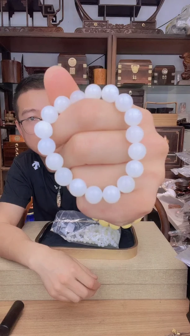 乌木类书架435塑料玉化1.0单圈手串  有气孔瑕疵