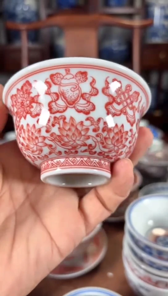 柴窑釉里红莲托八宝压手杯杯